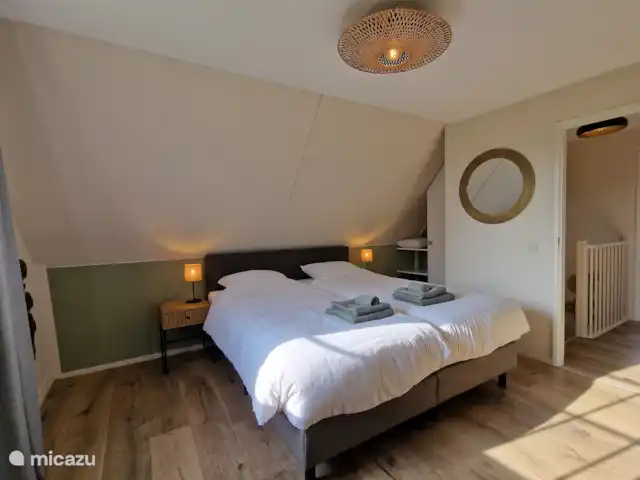 Slaapkamer boven met weidezicht